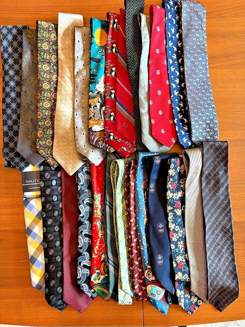 Assortment of 25 men’s neck ties.